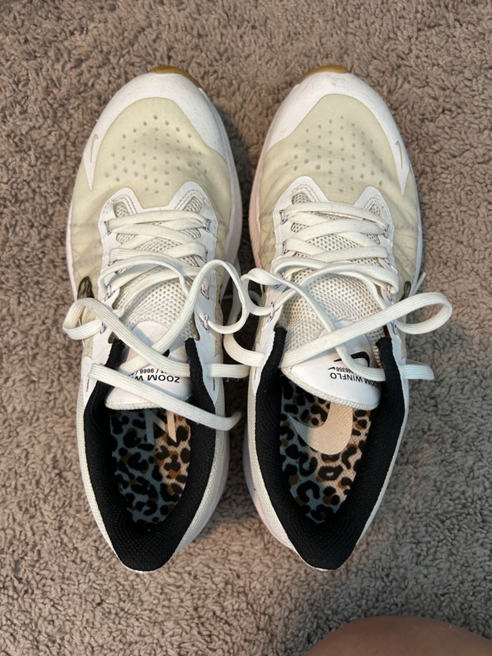 Nike Women's White and Black Athletic Sneakers with Leopard Insole Accents